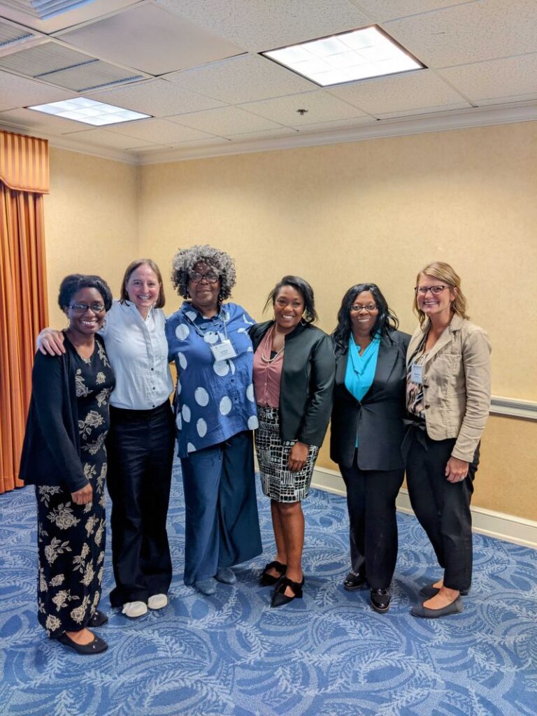 6 educators and District C coaches at VACTEA conference